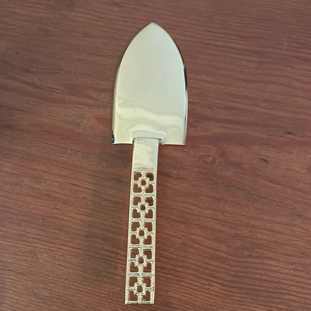 Jonathan Adler Nixon brass cake knife